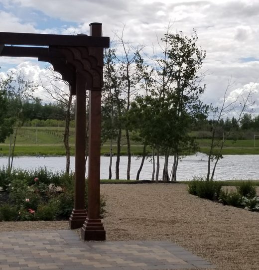 Wedding Garden Arch with View towards Pond